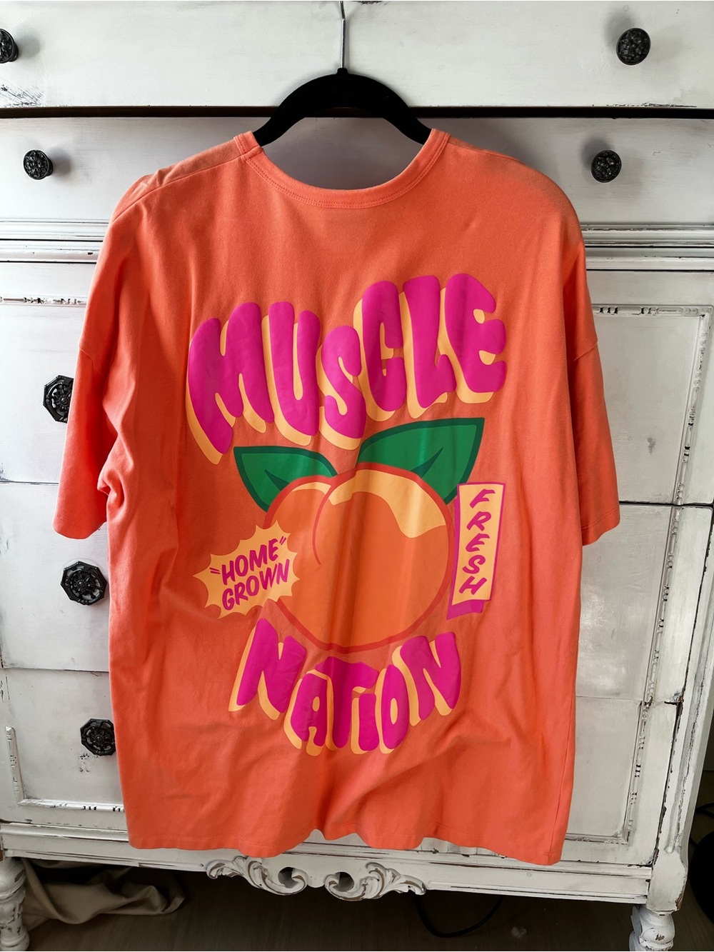 Muscle Nation peach gym tee